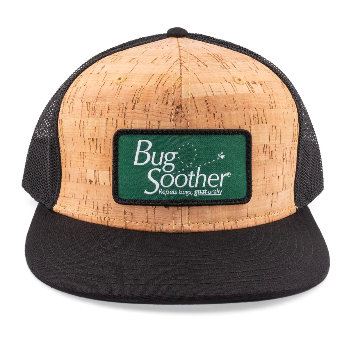 A trucker-style cap with a natural cork front panel, black mesh back, and black flat brim. The front features a green rectangular patch with the text 'Bug Soother Repels bugs, naturally'.